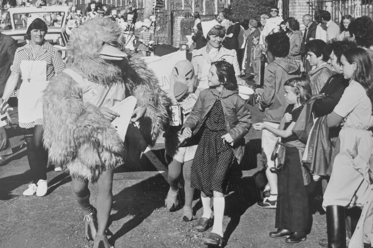 Archive. Ogwell Carnival from September 1981.Busby leads the procession off