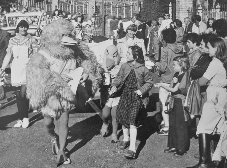 Archive. Ogwell Carnival from September 1981.Busby leads the procession off