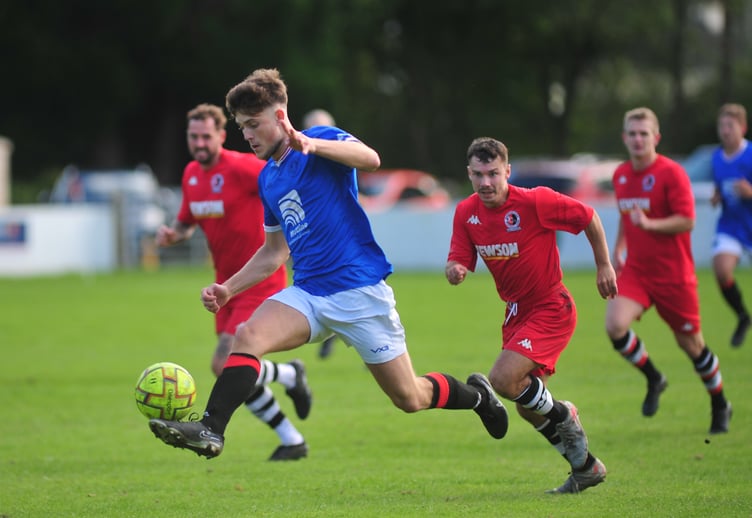 South West Peninsula League football. Premier League East. Honiton Town versus  Newton Abbot Spurs. A 3-2 away win for Spurs  against the Hippos