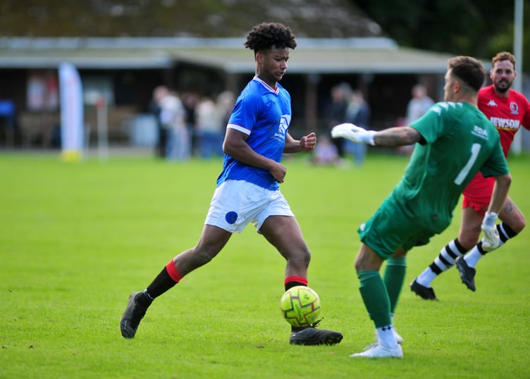 South West Peninsula League football. Premier League East. Honiton Town versus Newton Abbot Spurs. A 3-2 away win for Spurs against the Hippos