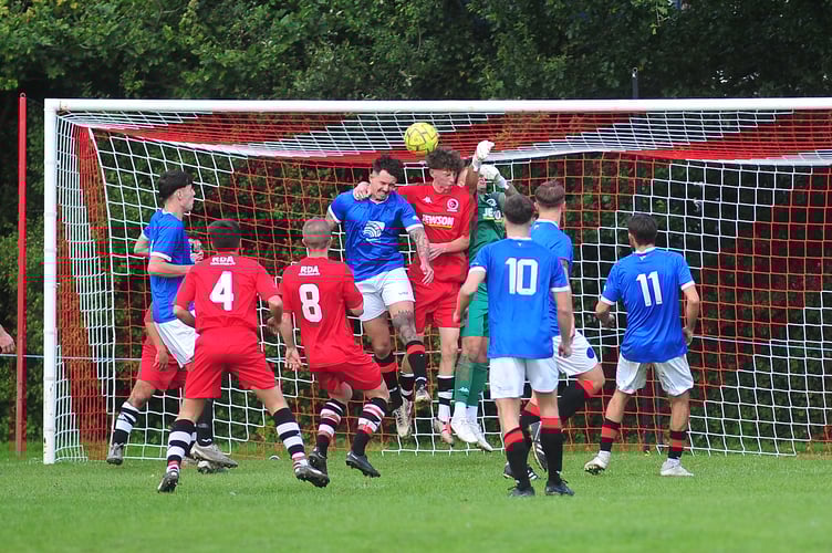 South West Peninsula League football. Premier League East. Honiton Town versus  Newton Abbot Spurs. A 3-2 away win for Spurs  against the Hippos