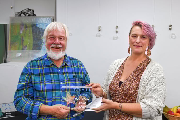 Brian Taylor receiving the Public Choice award from TRAIL organiser Sam Lock (Photo: David Caunter)