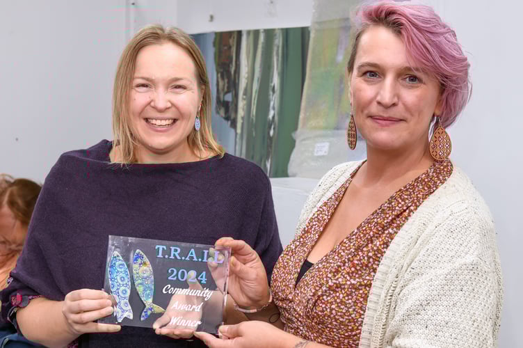 Sarah Pratt receiving the Community award for the Montgomery Primary School The Great Wave sculpture in the 2024 Teignmouth Recycled Art in the Landscape exhibition