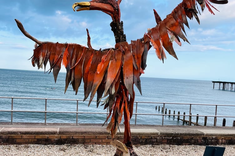 A Phoenix Rising from Climate Change by Amanda Lyon-Smith and Bryan Taylor in the 2024 Teignmouth Recycled Art in the Landscape exhibition.