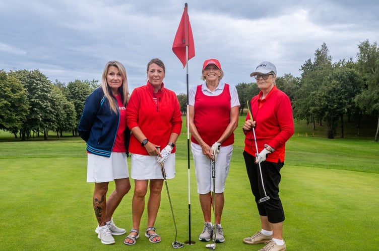 All in red for Dainton Park Captain's Charity Day
