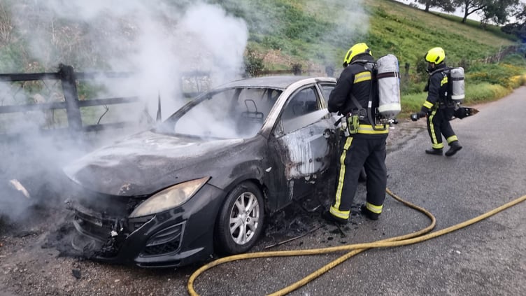 Firefighters from Newton Abbot tackle car fire. Photo Newton Abbot fire station