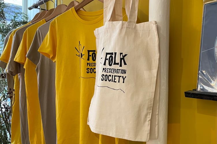 Folk Preservation Society bags and t-shirts