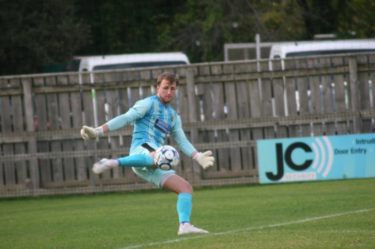 Buckland Athletic Goalkeeper Adam Seedhouse-Evans lets loose