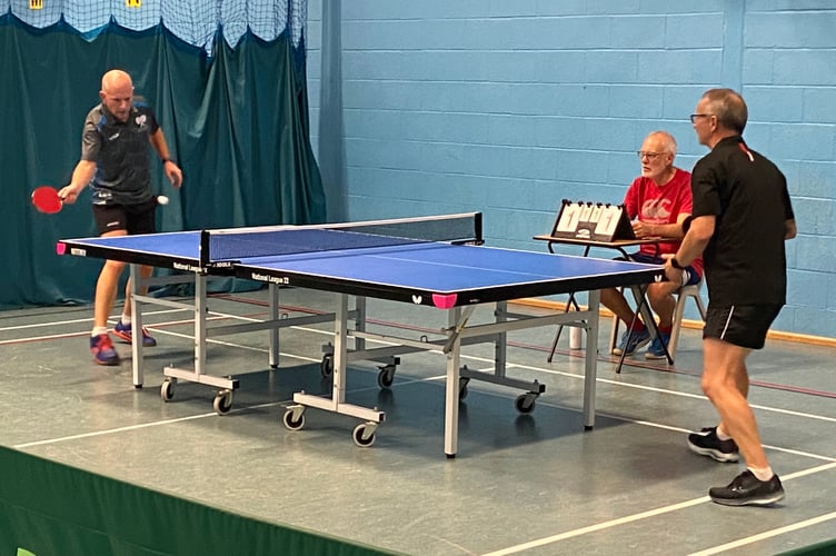 Kevin Nicholls from Newton Abbot Buzzards v Jim McIvor from Newton Abbot Owls in the table tennis first division fixture