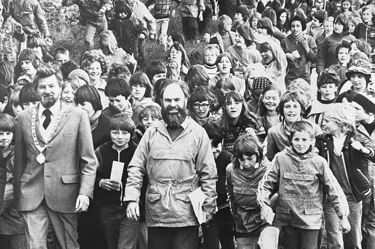 Sydney Williams leads the Christian Aid charity walk off at Newton Abbot Racecourse  in May 1978