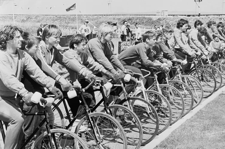 Line up for the start of the second leg of the  Exeter-Dawlish-Kingsteignton-Shaldon cycle race at Dawlish Warren at the beginning of July 1984