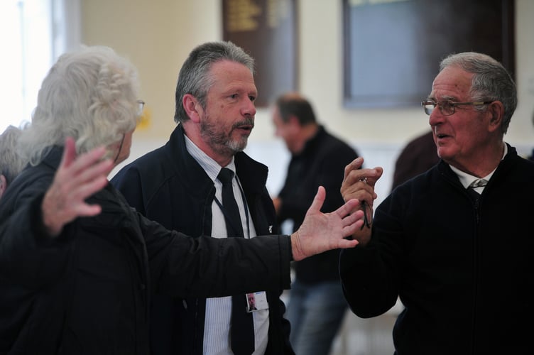South West Water unveil plans for new storm overflow works in Dawlish at a consultation meeting at The Manor House in the town. SWW's Barry Birch, Stakeholder Relations lead tries to answer the many, many questions concerned 