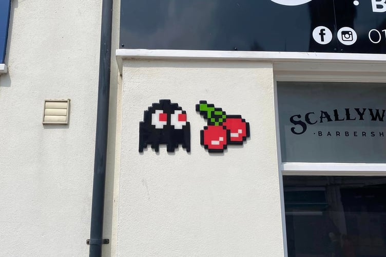 A map shows the locations of all the ghost street art installations in Teignmouth