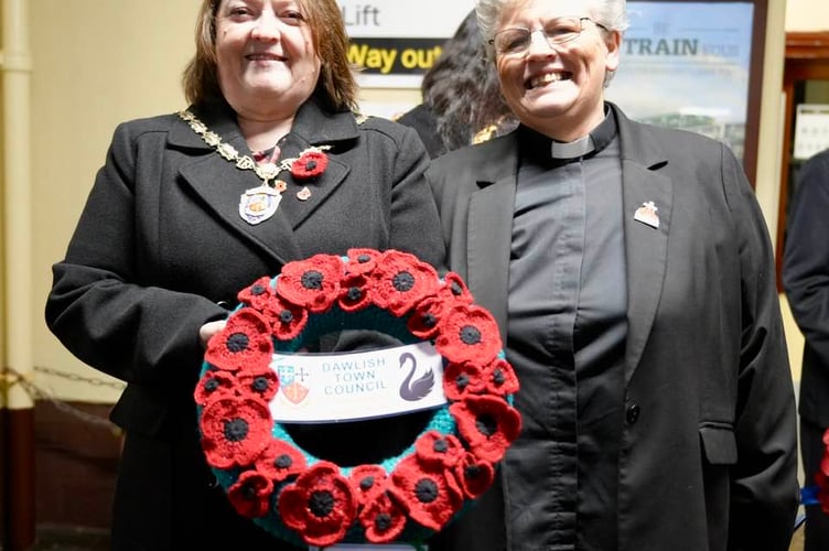 Mayor of Dawlish Cllr Lin Goodman-Bradbury and Revd Linda Cronin at Dawlish Station with the wreath. Photo Bob Simpson 