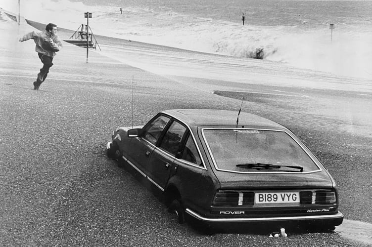 This engine of this Rover won't turn-over as it stays stuck in sand on Teignmouth sea front in 1988