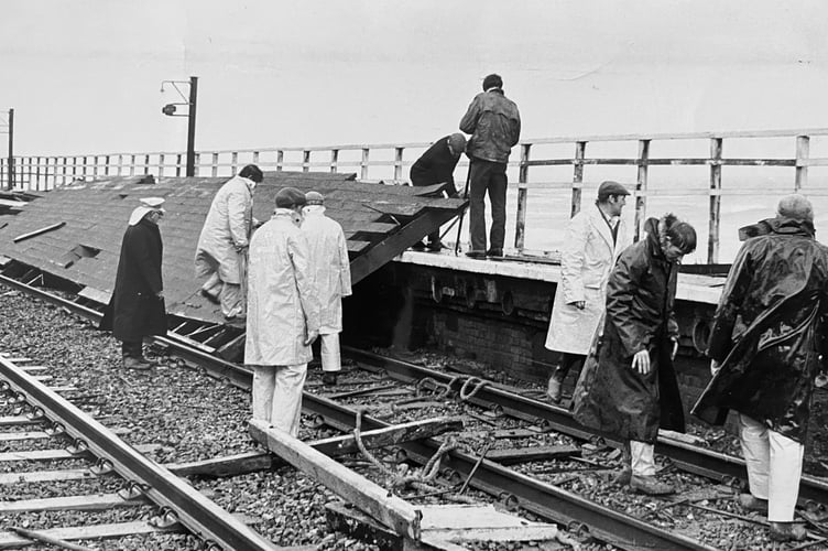 Inspecting storm damage at Dawlish Railway Station in February 1974