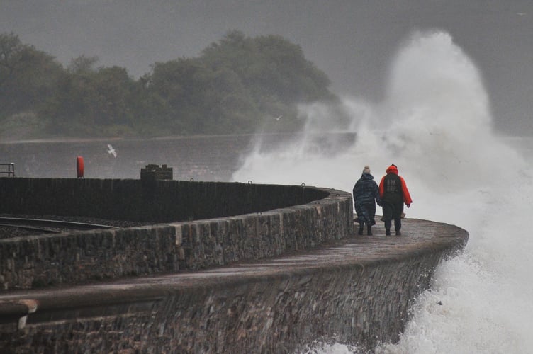 Storm Bert. Waves batter the sea wall walk at Teignmouth
