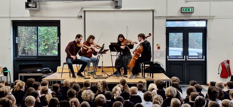 The Treske Quartet perform for youngsters at Canada Hill Primary School.