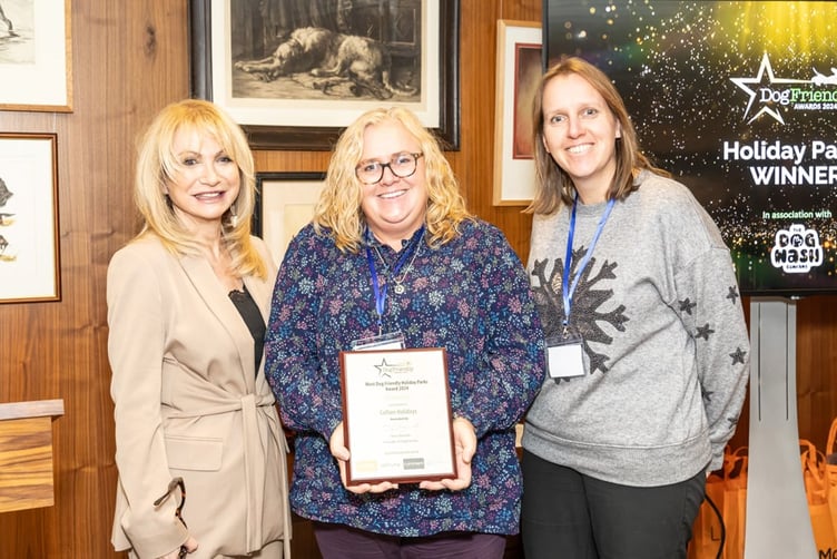 Actress Debbie Arnold presented the Holiday Park of the Year award to Cofton Holidays directors Helen Scott and Mellony Kirby at the Dog Friendly Awards 2024