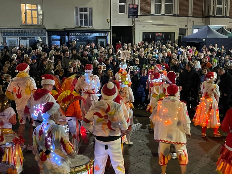 Samba band Street Heat entertained hundreds of revellers gathered in Teignmouth Triangle to watch the Christmas lights switch on 2024