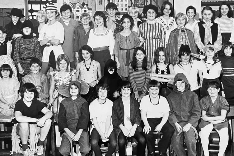 The cast of Ashburton Primary School's pantomime line up for the camera in December 1977