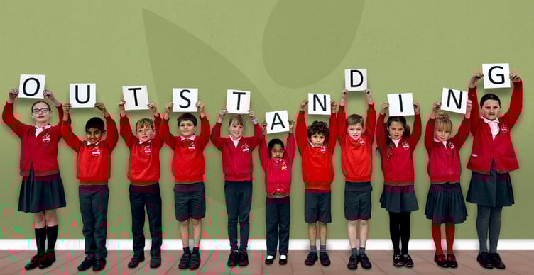 Shaldon Primary School pupils are certainly happy at having been graded as Outstanding