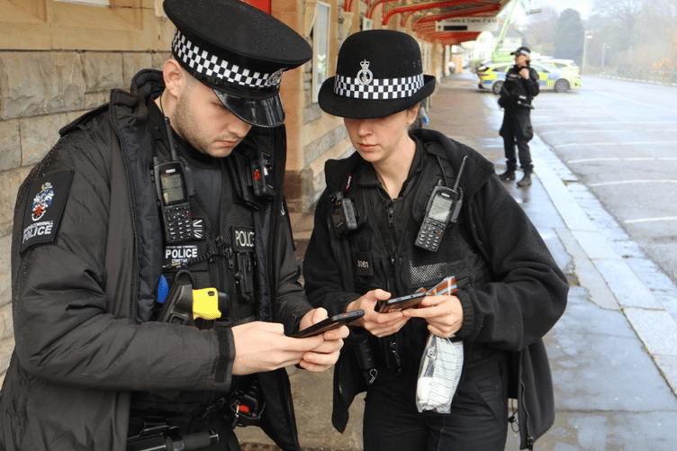 Police officers Nathan Smith and Helen Griggs at Torquay Railway Station