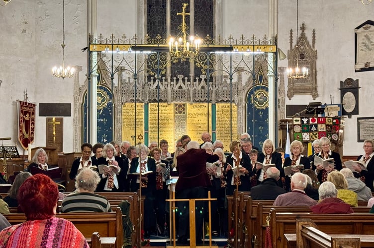 Teign Choral Society raising the roof of St James at its annual carol concert in aid of Teignmouth Hospital League of Friends (Photo: Viv Wilson)
