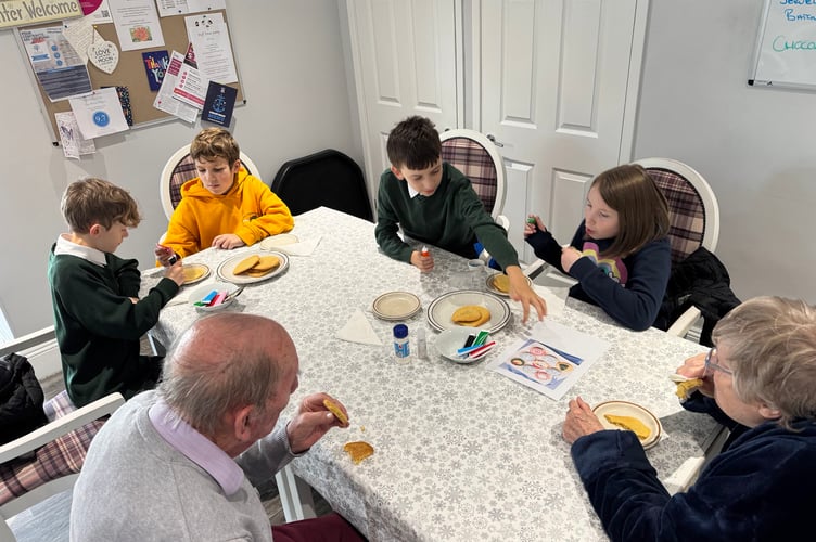 Young and old enjoyed decorating Christmas cookies as pupils from OLSP joined residents from The White House for some festive activities