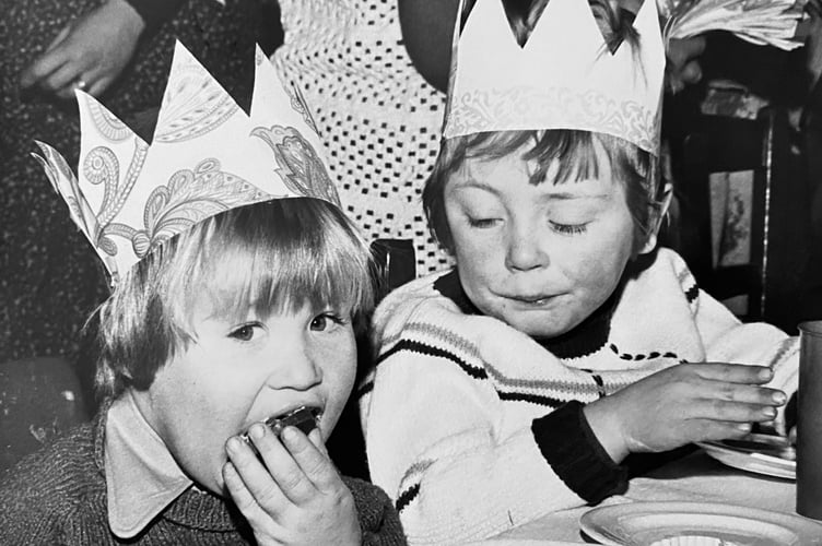 Youngsters tuck in to the party food at Ashburton Playgroup's Christmas party in December 1975
