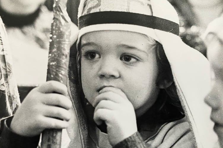 Pensive shepherd Lloyd Freeman (3)  from Ashburton Playgroup's nativity play from December 1993