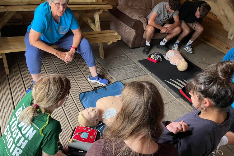 Sue teaching a defibrillator session