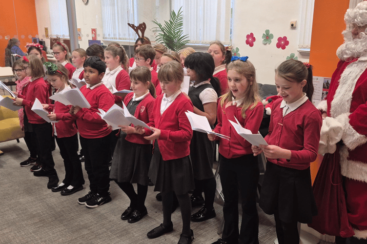 Pupils from Wolborough Primary School recently sung Christmas carols at Newton Abbot Library