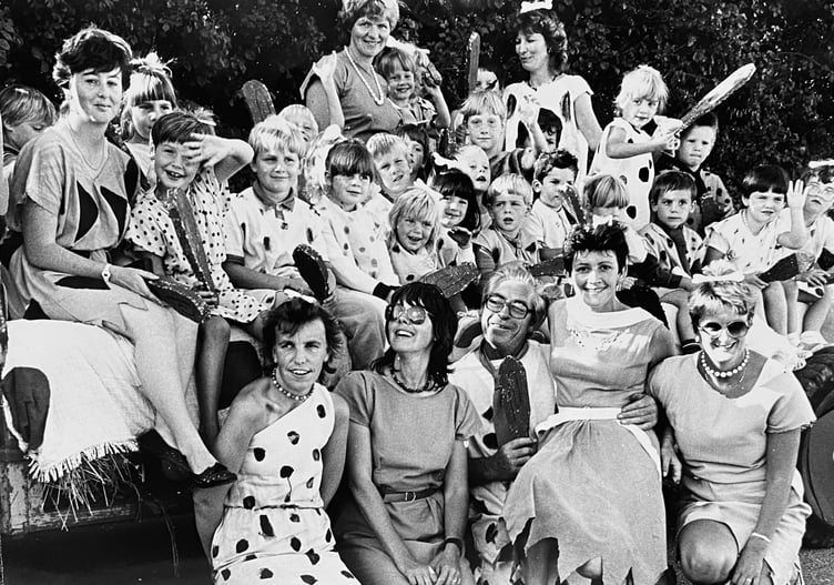 Meet the Flintstones. Kingsteignton Playgroup head down to Bedrock during the town's carnival in September 1987