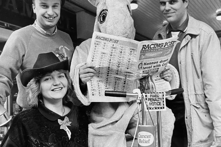Newton Abbot Rotoract members Russell Cook, Alison Clare, Jon Morren and Ian Hutchings raising money for Cancer Relief in November 1993