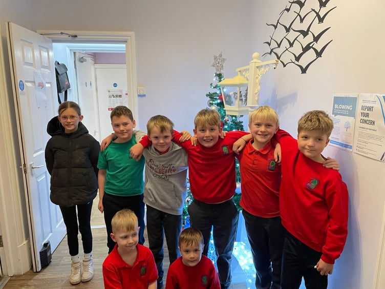 Children from Hazeldown Primary School visited residents at Croft Lodge Care Home.