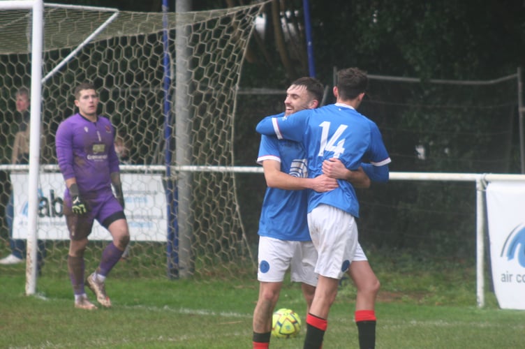 Owen Green celebrates after scoring from the spot