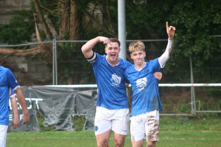 Lewis Breslan and Harry French pose for the camera