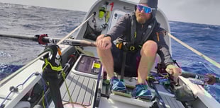 Atlantic rowers break 1000-mile mark