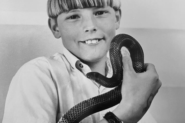 Snakes Alive! Shaine Sell brought his pet Honduran  milk snake 'Sampson' to Milber Primary School's Hobbies Exhibition in April 1995