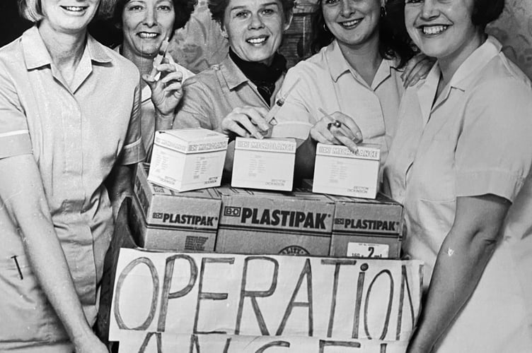 Marilyn Galvin, Shirley Nightingale, Susan Broderick, Tracey Lightfoot and Deidre Williams from Palm Court Nursing Home in Dawlish with a collection of syringes to be sent to Bosnia at part of Operation Angel in November 1993