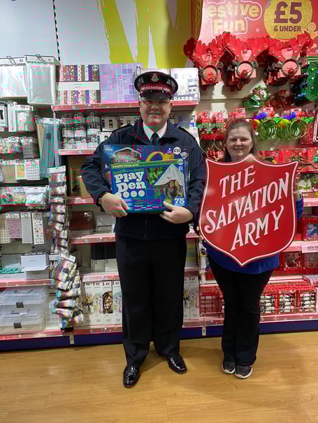 SALLY ARMY NA appeal Major Nigel Byrne, the local leader of The Salvation Army with Sharon, the manager of the Newton Abbot branch of The Works