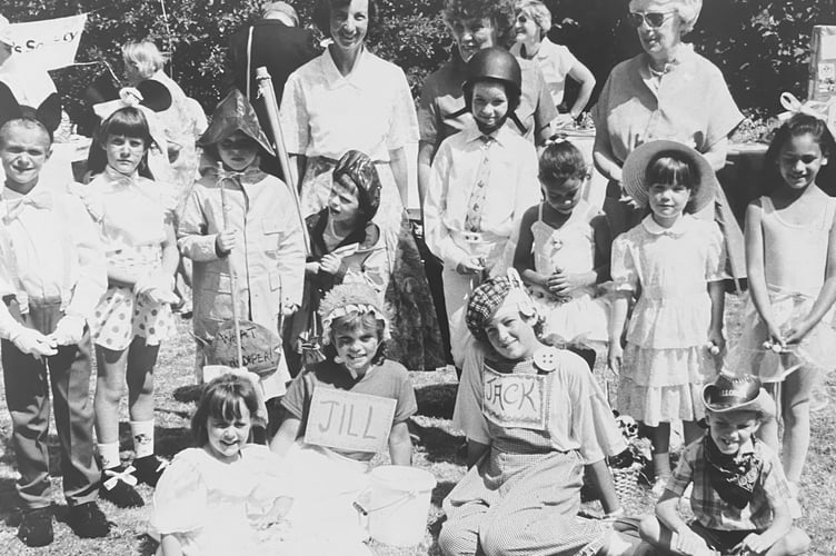 Summer fete at the Vicarage in Teignmouth Road, Teignmouth. Judges Mrs P James, Rev Joan Debenham and Mrs P Cruse with youngsters who were taking part in the fancy dress competition