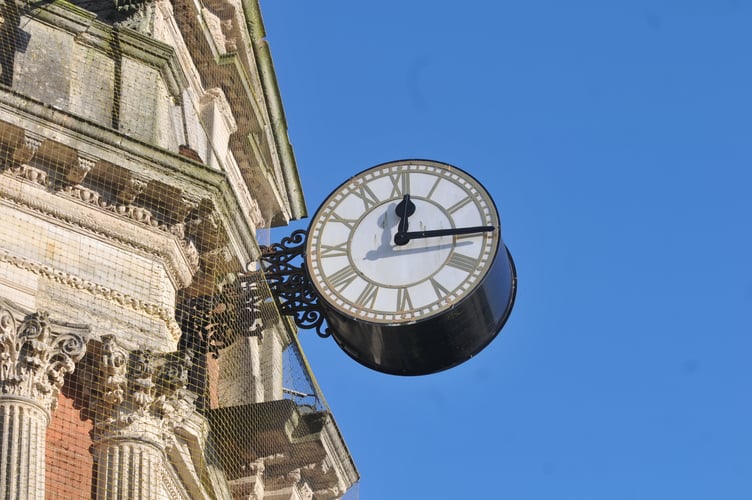 Telling the time correctly just twice a day. The stuck clock on Lloyds Bank in Newton Abbot's Courtenay Street.