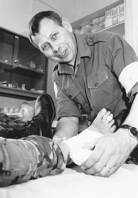 Ashburton's Claude Trudgill practises his first aid skills on a volunteer casualty during the 1989 Ten Tors event