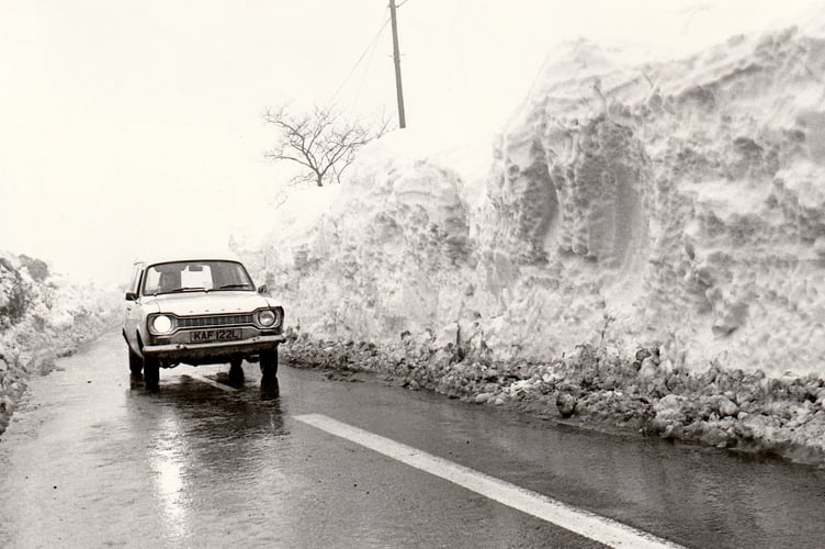 The north wind did blow  -and we did have snow in February 1978.  Snow drift banks  dwarf this  Mk1 Ford Escort on the edge of south Dartmoor