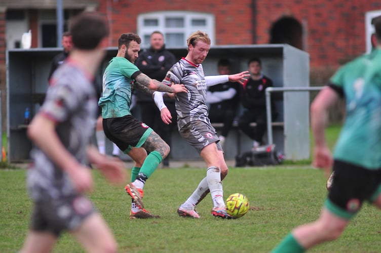 Football.  South West Peninsula League Premier East.  Sidmouth Town versus Bovey Tracey. A 3-0 home win for the The Vikings against visitors Bovey