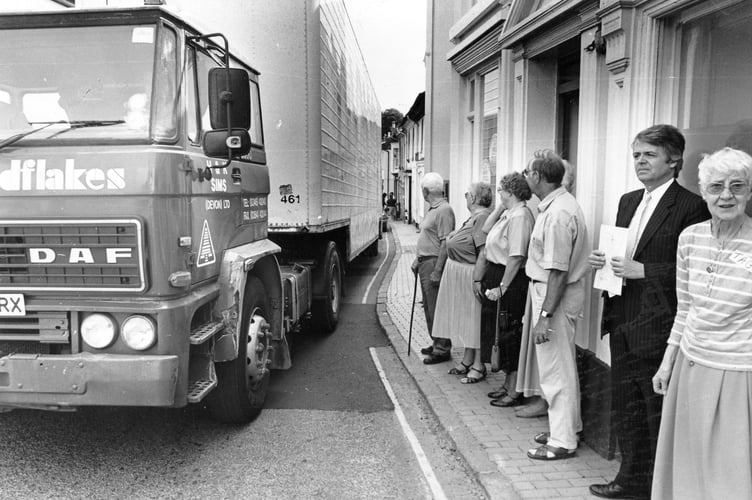 A tight squeeze. June 1994 and Teignbridge MP Patrick Nicholls joins members of Buckfastleigh's Traffic Action Group to see their concerns at first hand