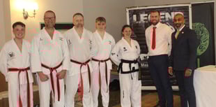 Black belt promotions for martial arts quintet
