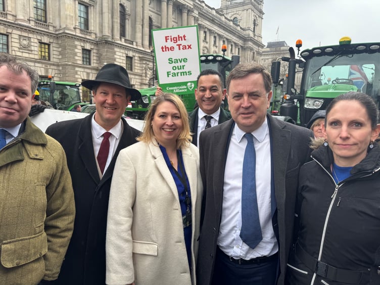 Central Devon MP Male Stride with some of the protesting farmers.